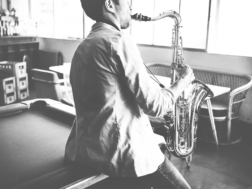 Jazz saxophonist performing in tribute to John Coltrane’s musical legacy